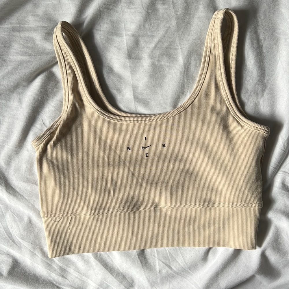 Womens beige Nike workout cropped top.